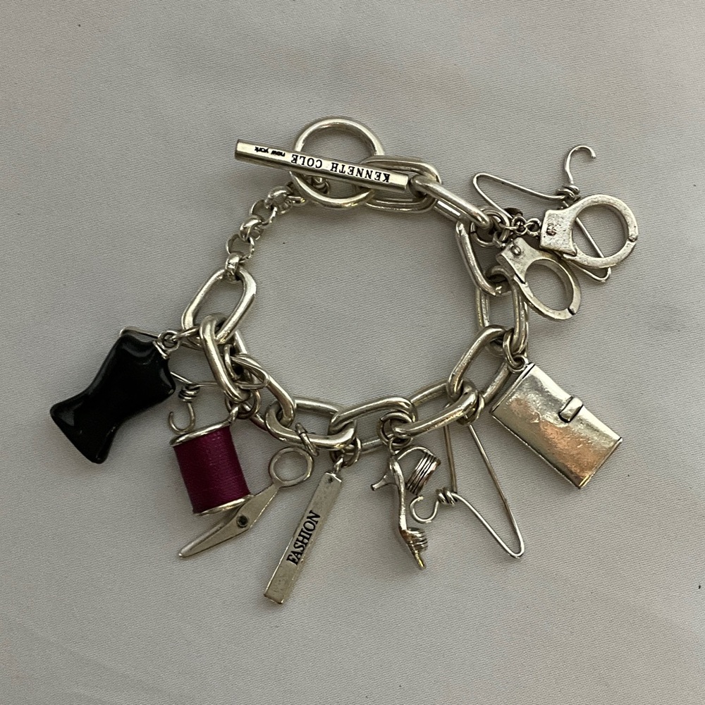 Kenneth Cole Silver Fashion Charm Bracelet with Black and Pink Accents